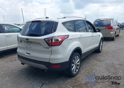 2017 Ford Escape Titanium из США, поврежденный, VIN 1FMCU9J96HUB13616